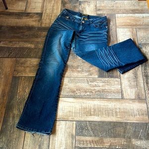 Derwin, distressed denim jeans. Cute details. Whiskering front and back